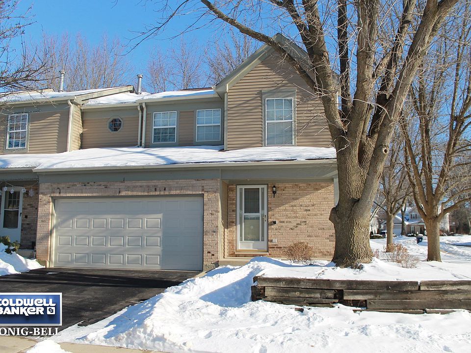 Attractive Brick Front End Unit Location with spacious side yard!