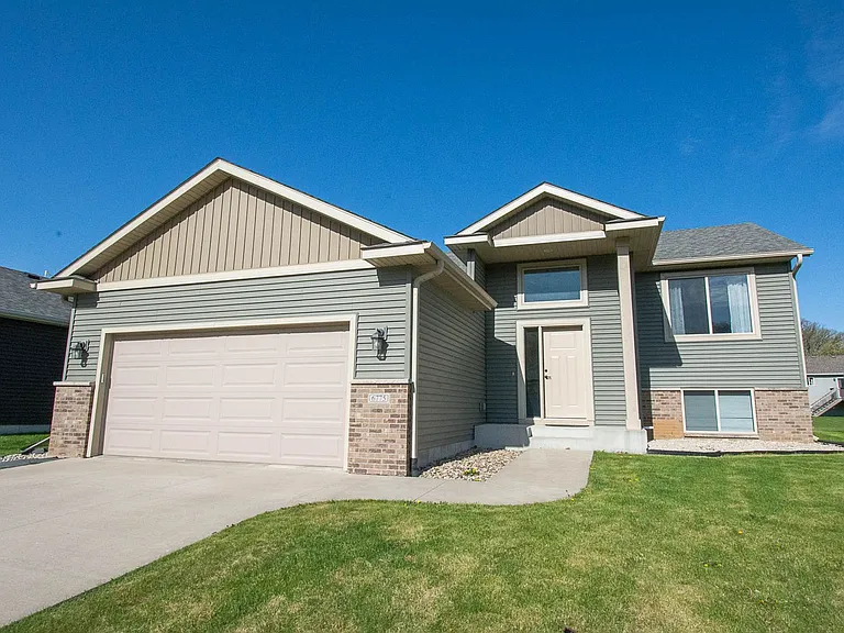 6775 Gaillardia Dr NW — Photo 1