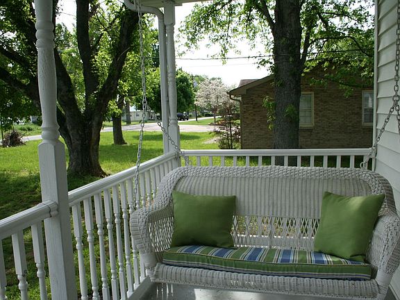 Porch perfect for sitting and swinging