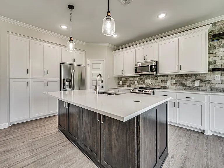 True cabinets under the island front and back. Eat in Kitchen will fit 4 bar stools