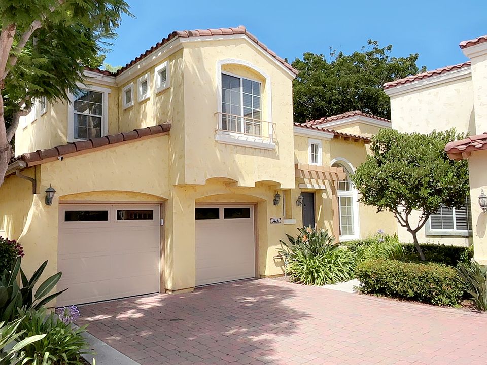 Large detached 4 bedroom/3 bath house on corner lot.