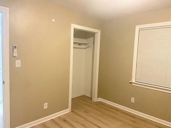 Bright and spacious bedroom with ample natural light, a generous closet for plenty of storage space for clothing and personal items, and its own mini-split system for personalized heating and cooling, ensuring comfort in every season.