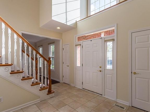 Wonderful 2 story entry with huge windows and high ceilings