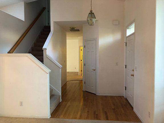 Front door/Stairway/hallway closet