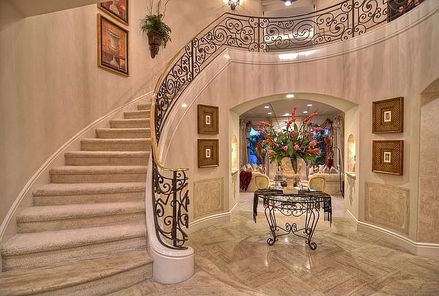 Grand Entry to Wrought Iron Staircase