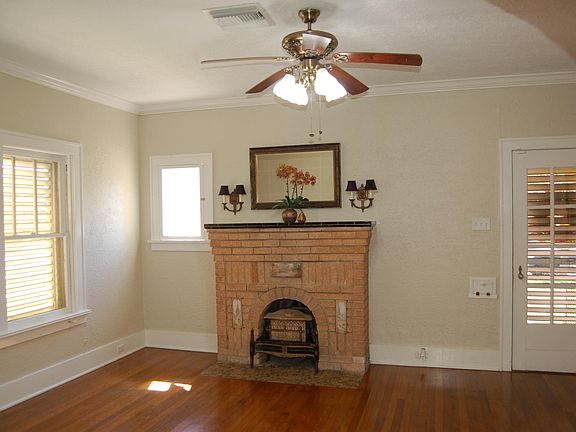 Faux fireplace in living room.