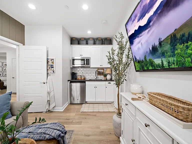 Gen-suite entry with view of living room and kitchenette