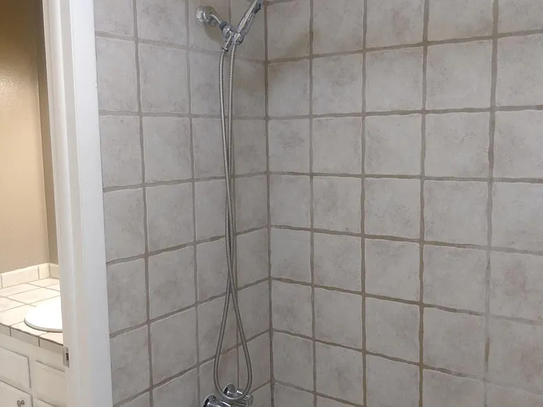 Level 2 shower and bathtub with separate powder room.
