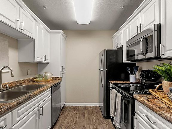 If you love to cook, then our galley-style kitchen is perfect for you, equipped with stainless steel appliances and plenty of counter space!