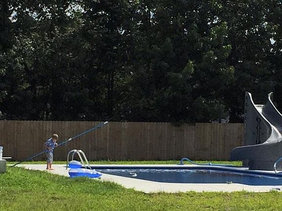 Salt water pool with slide