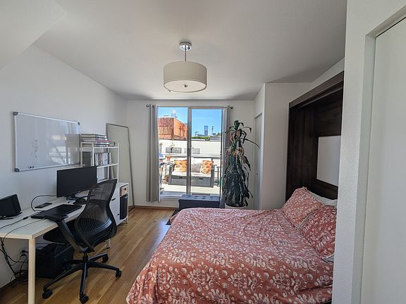 2nd bedroom with murphy bed open.