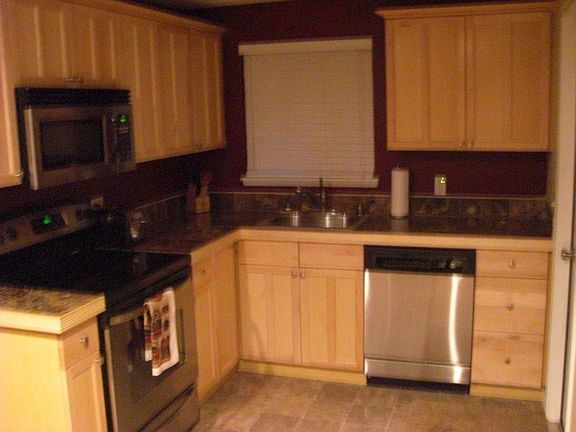 large kitchen with lots of cupoboard space