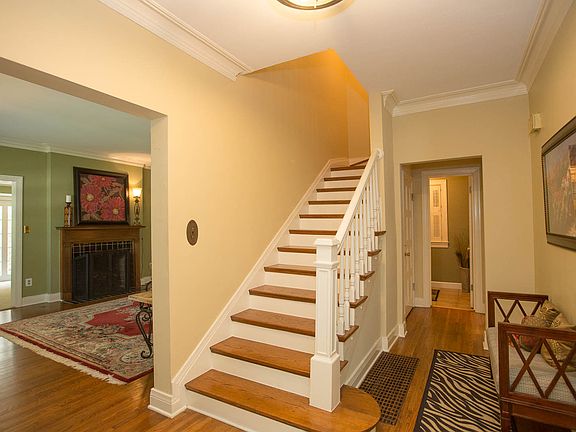 Wooden Staircase Leading to Upstairs
