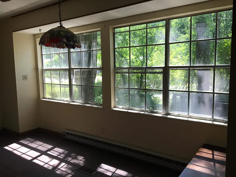 Gorgeous green views from all sides. These windows are in kitchen