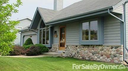 Warm and Inviting : Beautiful exterior featuring magnolia, hibiscus, maples trees along with patio.
