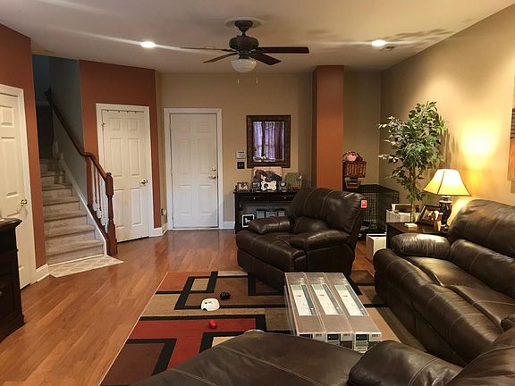 Finished basement with garage and backyard access.