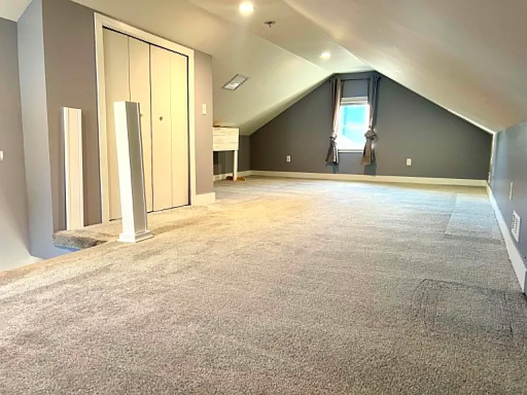 Large Second floor bedroom, newly painted, and carpeted within 3 years. Large closet with double doors.
