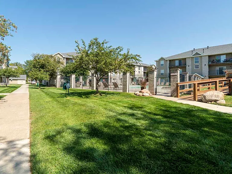 Wide grassy areas perfect for pets or a casual outdoor break.