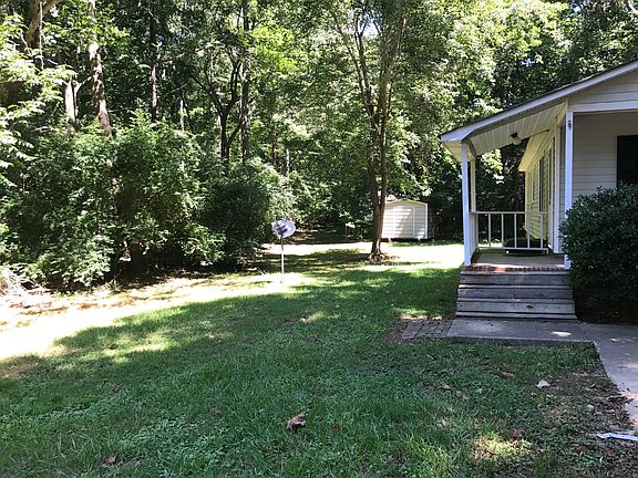 Side view of property, storage building