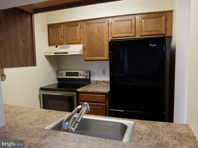 4906 Ravens Crest Dr — Photo 18