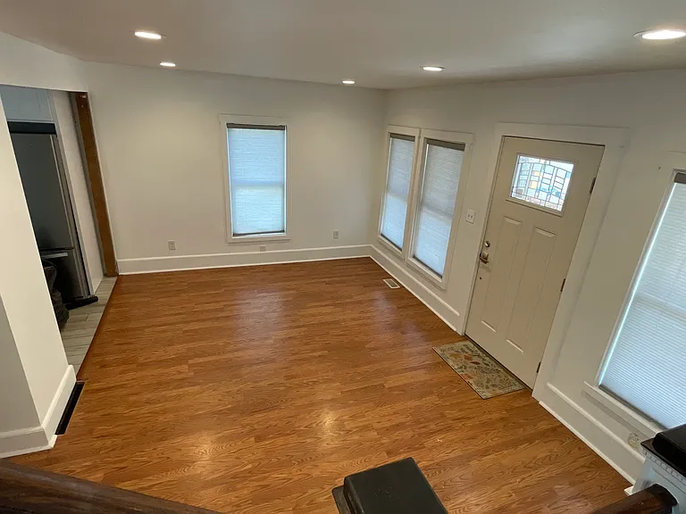 Inviting living room with hardwood floors and great natural light. Ready to make your own.
