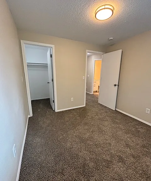 bedroom w/walk in closet