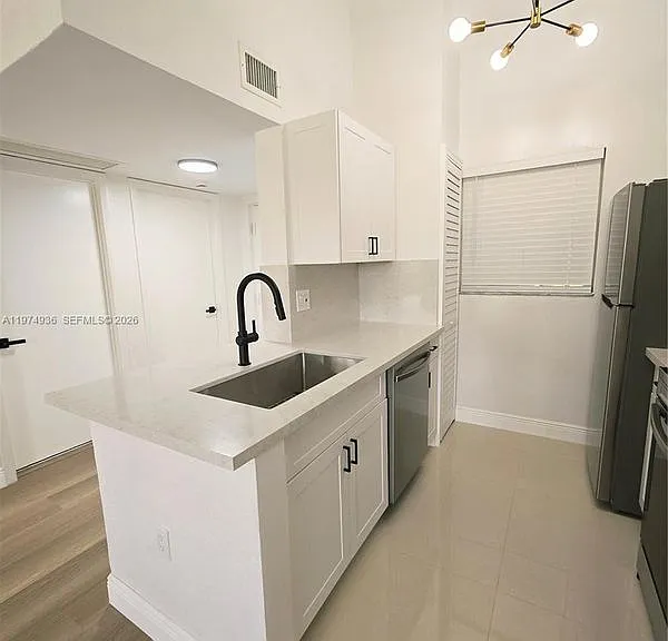 2881 N Oakland Forest Dr #310 — Photo 10