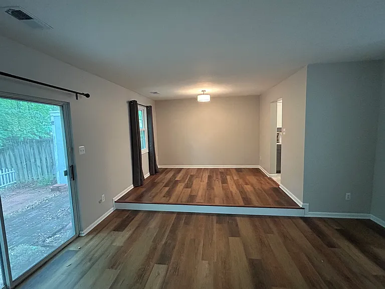 Living room with step-up dining room