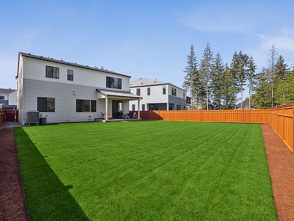 Covered Rear Patio and Fenced Rear Yard