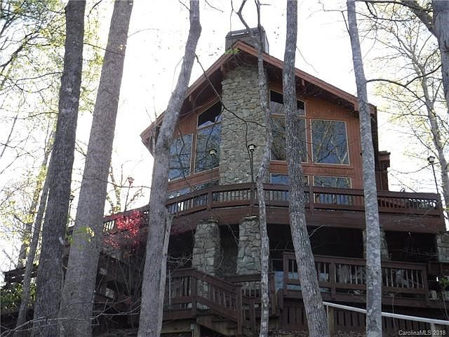 Majestic Lindal Cedar Home with Stone Accents on Lake Adger