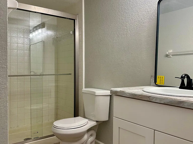 Master bath with shower sliding glass doors