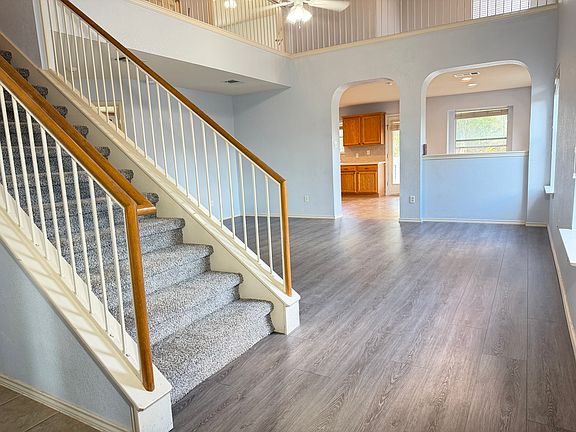 Walk into your large open floor plan living room. With newly installed hardwood flooring.