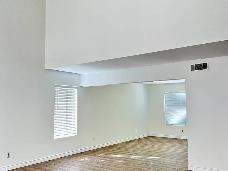 Vaulted ceilings Living Room and Formal Dining Room.