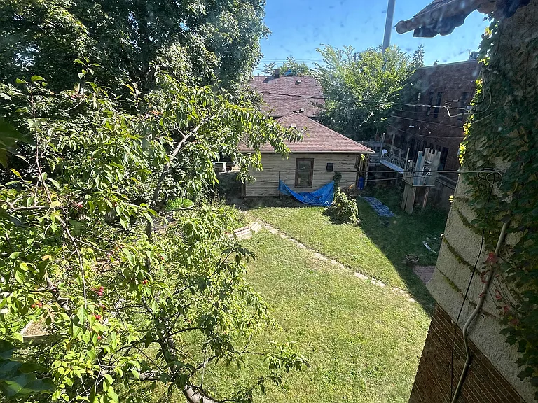 Middle bedroom overlooks the back yard