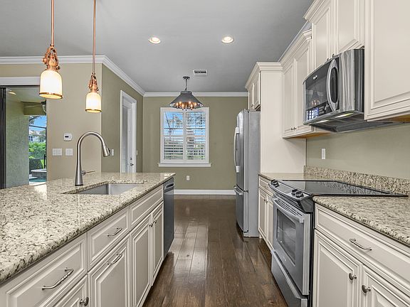 Gourmet Kitchen with Granite Countertops and Whirlpool Appliances