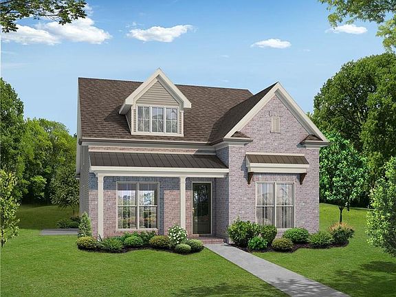 Artist rendering of home to be built. Three sides brick, fenced in yard, private alley garage on bac
