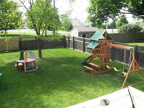 Large beautiful fenced in backyard