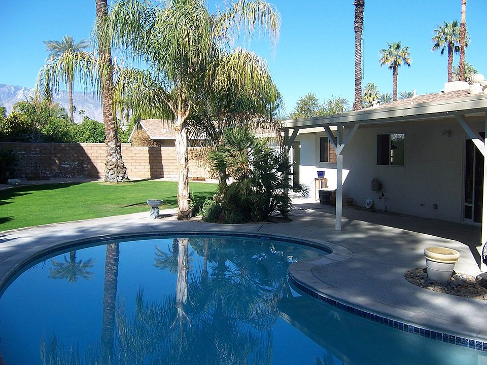 Sparkling pool and large yard