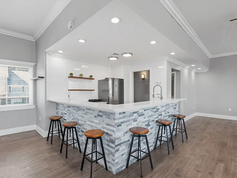 Welcome to Wymore 360 Apartments, where modern living meets stylish design. Enjoy a fully-equipped kitchen with elegant finishes and ample seating for entertaining. Elevate your lifestyle todayschedule a tour and see for yourself!