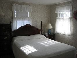 bedroom 2 with a queen bed