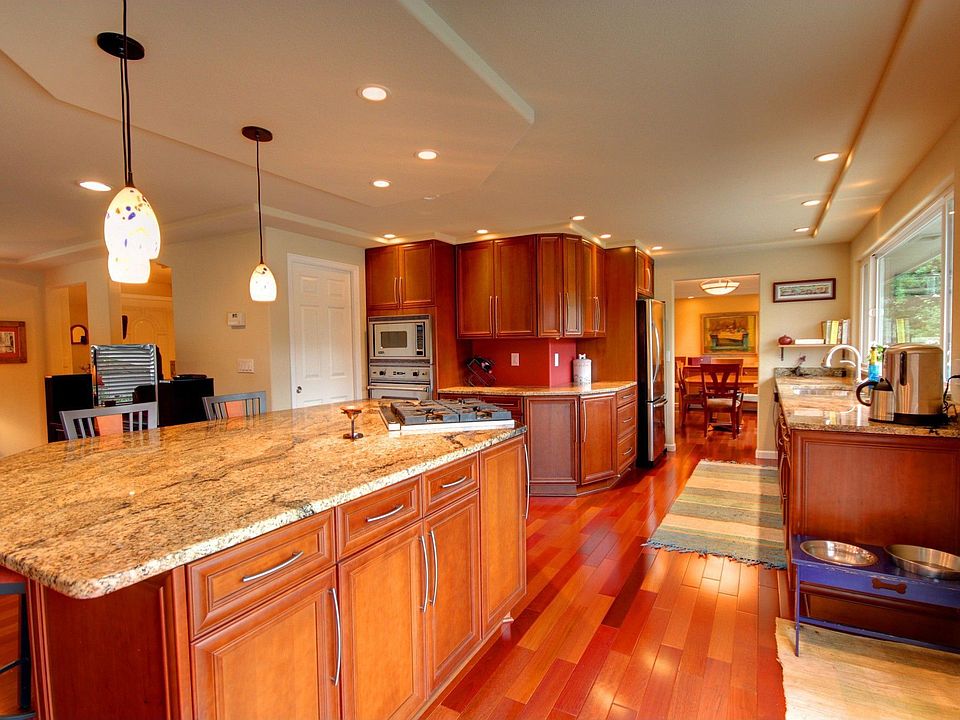 Cherry cabinets/Solid granite counters