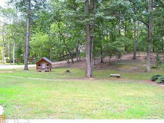 Backyard complete with grassy lawn!