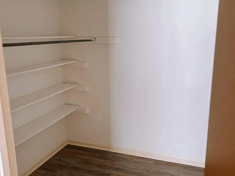 Walk in Closet adjacent to primary bedroom