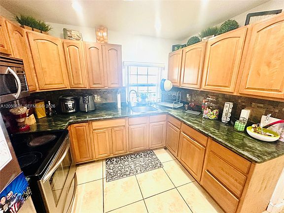 2nd image of 6837 W 19th Ct #6837