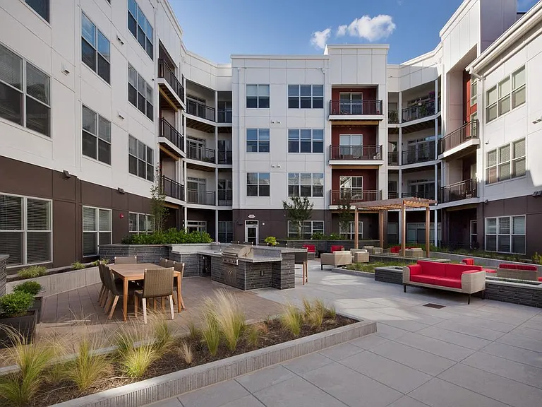 Relax or entertain in our beautifully landscaped outdoor courtyard, featuring premium grilling stations.