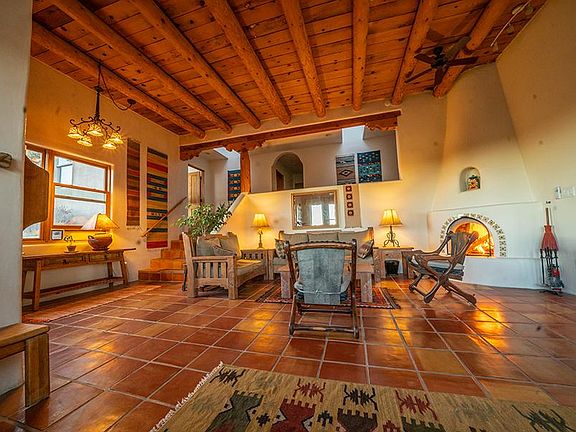Living room with wood burning fireplace
