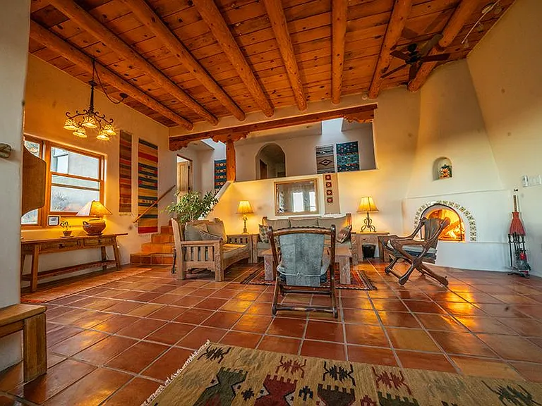 Living room with wood burning fireplace