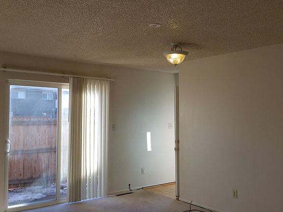 Living room with patio access