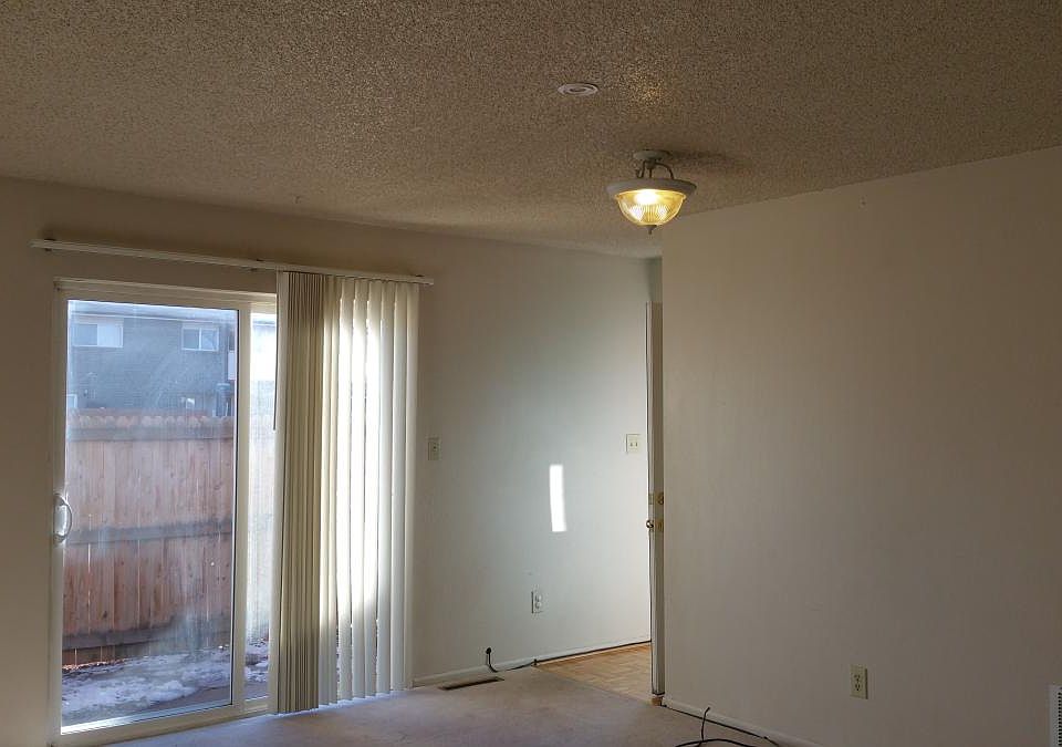 Living room with patio access