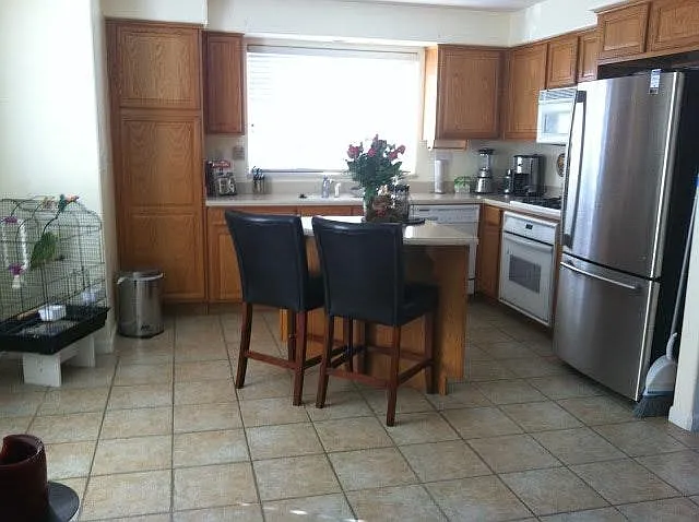Beautiful kitchen with Corian counter and plenty of storage